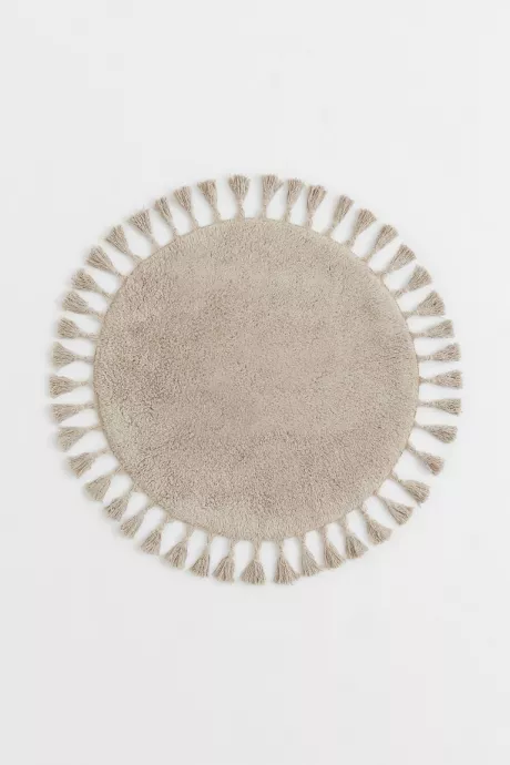 Runde Badematte mit Quasten